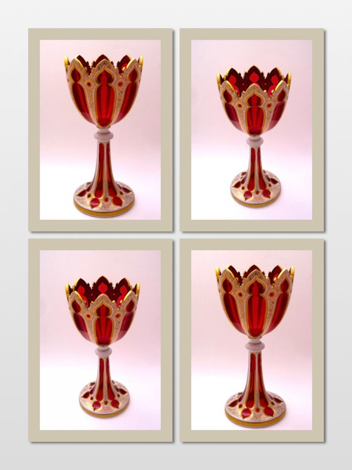 A Tall Bohemian Glass Red Overlay Vase