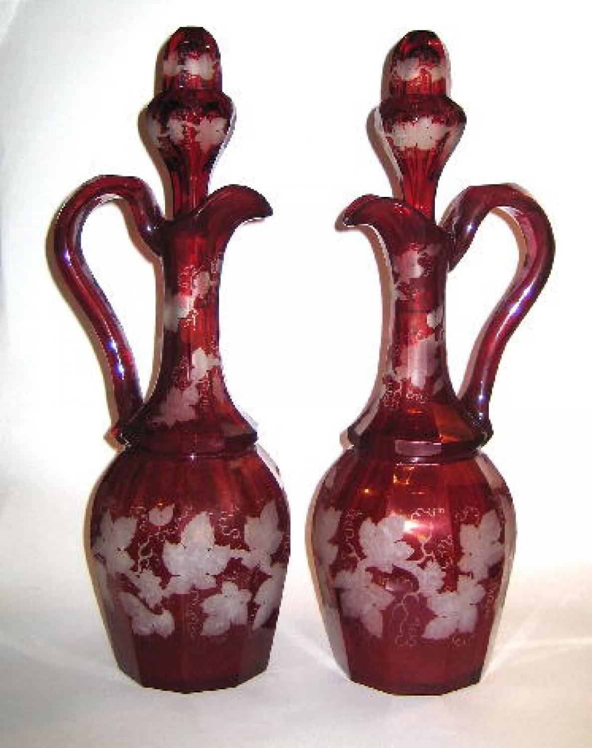 A Large Pair of Bohemian Ruby Red Decanters