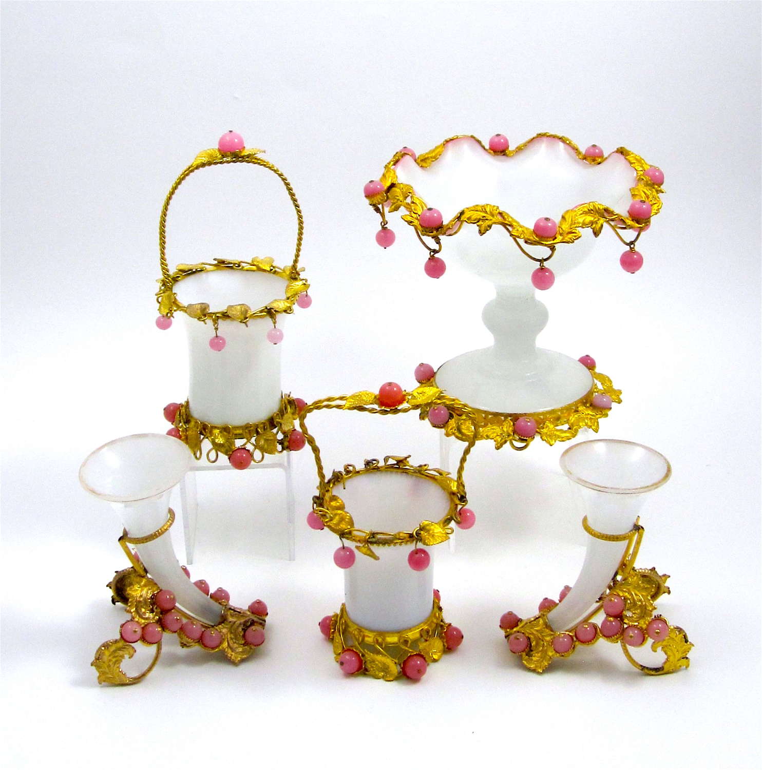 A Collection of White Opaline Glass Items with Pink Baubles