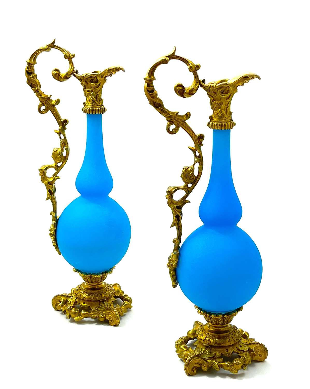 A Pair of Antique Quality French Blue Opaline and Dore Bronze Ewers
