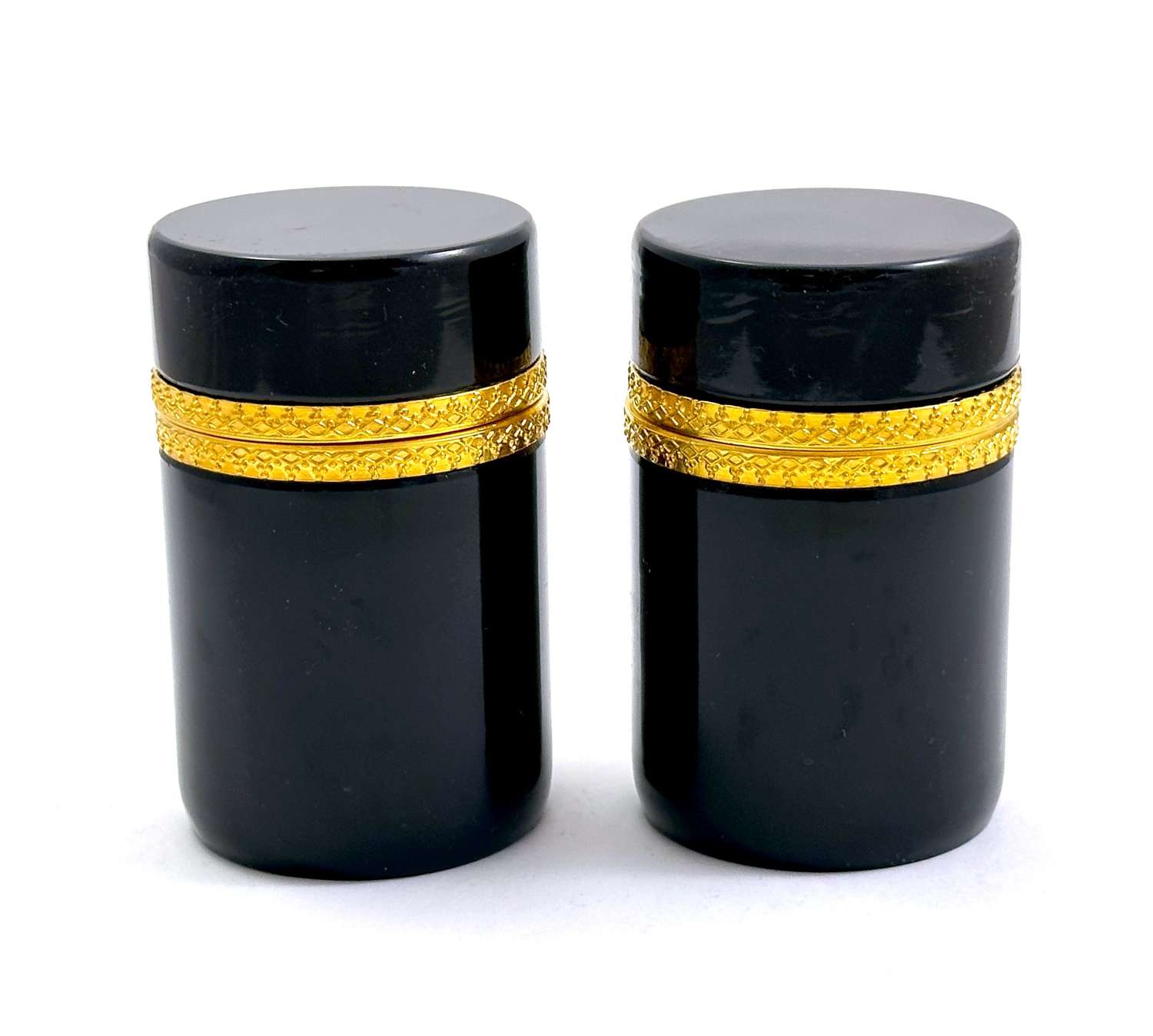 A Pair of Antique Black Opaline Glass Cylindrical Caskets