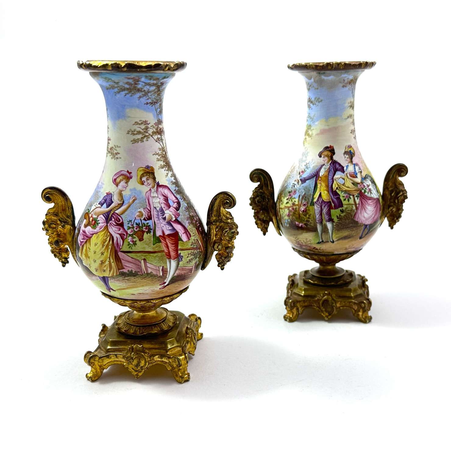 A Fine Pair of French Enemelled Vases with Dore Bronze Mounts.