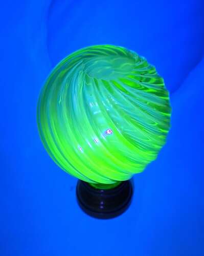 Rare Antique Uranium Cut Crystal Glass Boule D'Escalier with Swirl Pattern.