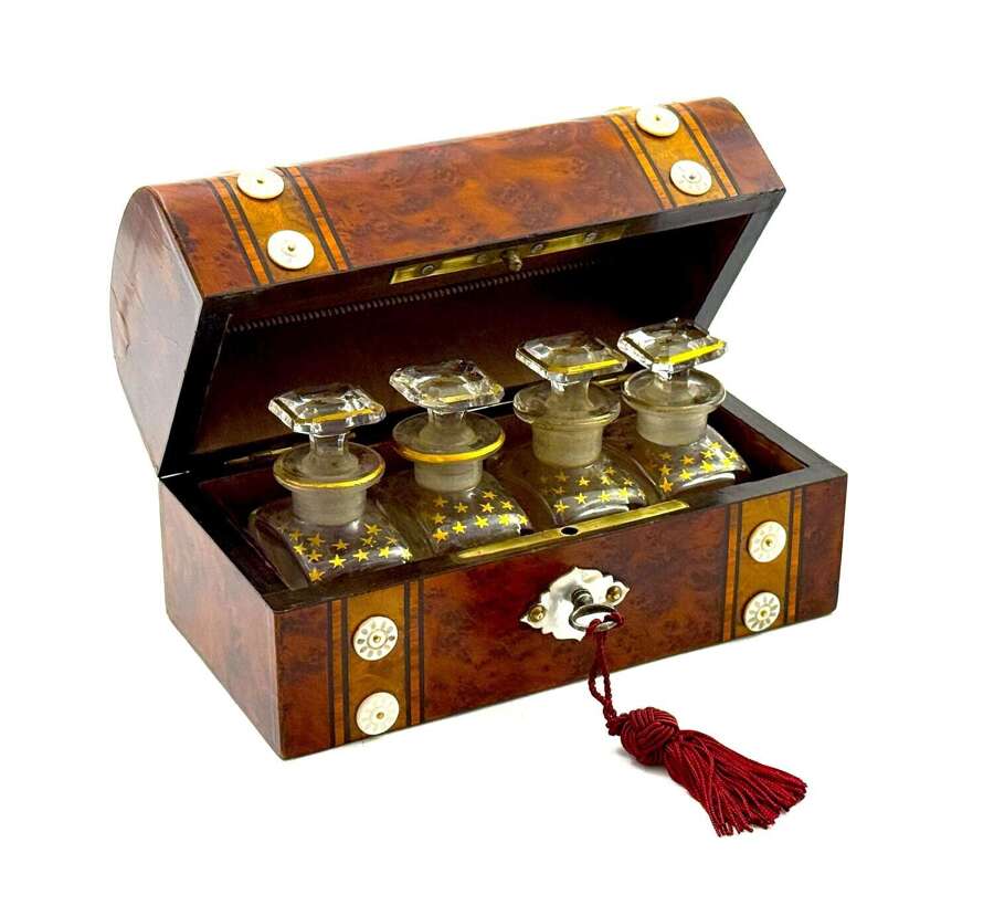 A Fine Antique Burr Walnut and Mother of Pearl Perfume Casket with Four Cut Glass Bottles