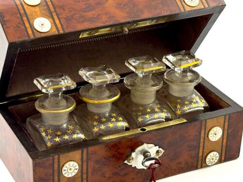 A Fine Antique Burr Walnut and Mother of Pearl Perfume Casket with Four Cut Glass Bottles