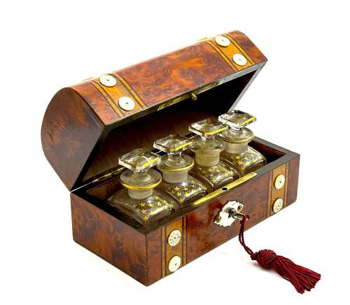 A Fine Antique Burr Walnut and Mother of Pearl Perfume Casket with Four Cut Glass Bottles