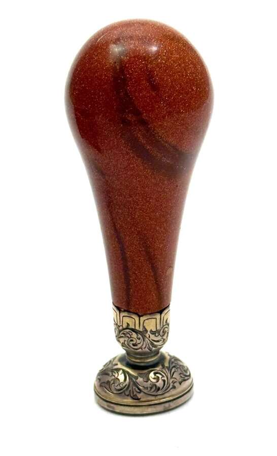 A Fine Antique Aventurine&nbsp;Seal with an Ornate Engraved Silver Seal Base