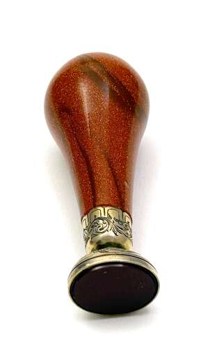 A Fine Antique Aventurine Seal with an Ornate Engraved Silver Seal Base