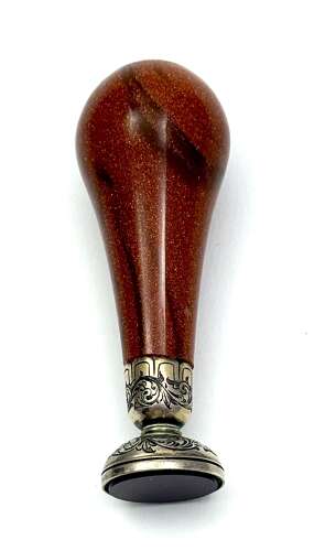 A Fine Antique Aventurine Seal with an Ornate Engraved Silver Seal Base