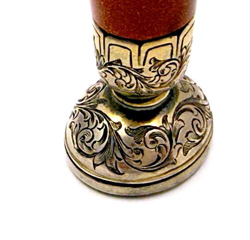 A Fine Antique Aventurine Seal with an Ornate Engraved Silver Seal Base