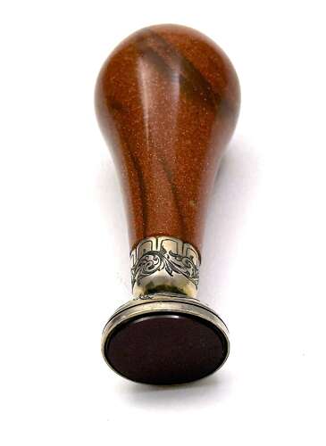 A Fine Antique Aventurine Seal with an Ornate Engraved Silver Seal Base