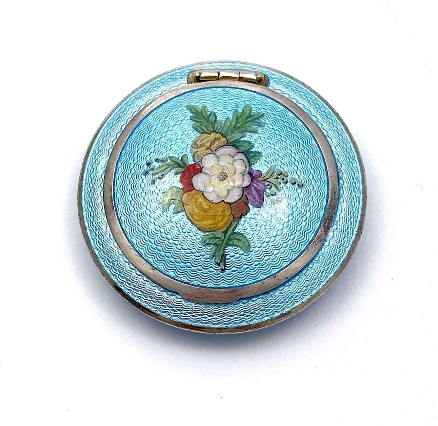 A Fine Antique Silver Compact Centred with a Hand-Painted Floral Bouquet.