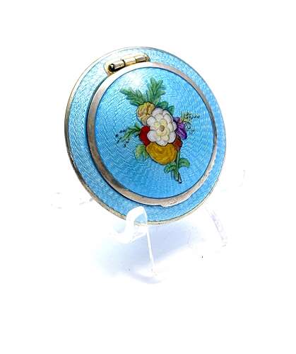 A Fine Antique Silver Compact Centred with a Hand-Painted Floral Bouquet.